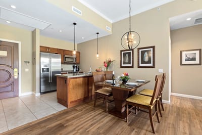 Sleek kitchen and cozy dining invite island-style meals and conversation.