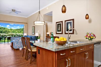 Your granite island offers bar seating and clear sightlines to the lanai, perfect for casual breakfasts.