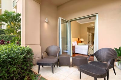 Sip coffee on your shaded patio seating just outside, surrounded by lush landscaping and privacy.