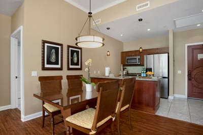 Share meals and conversation at your dining table, positioned between the granite kitchen and cozy living room.