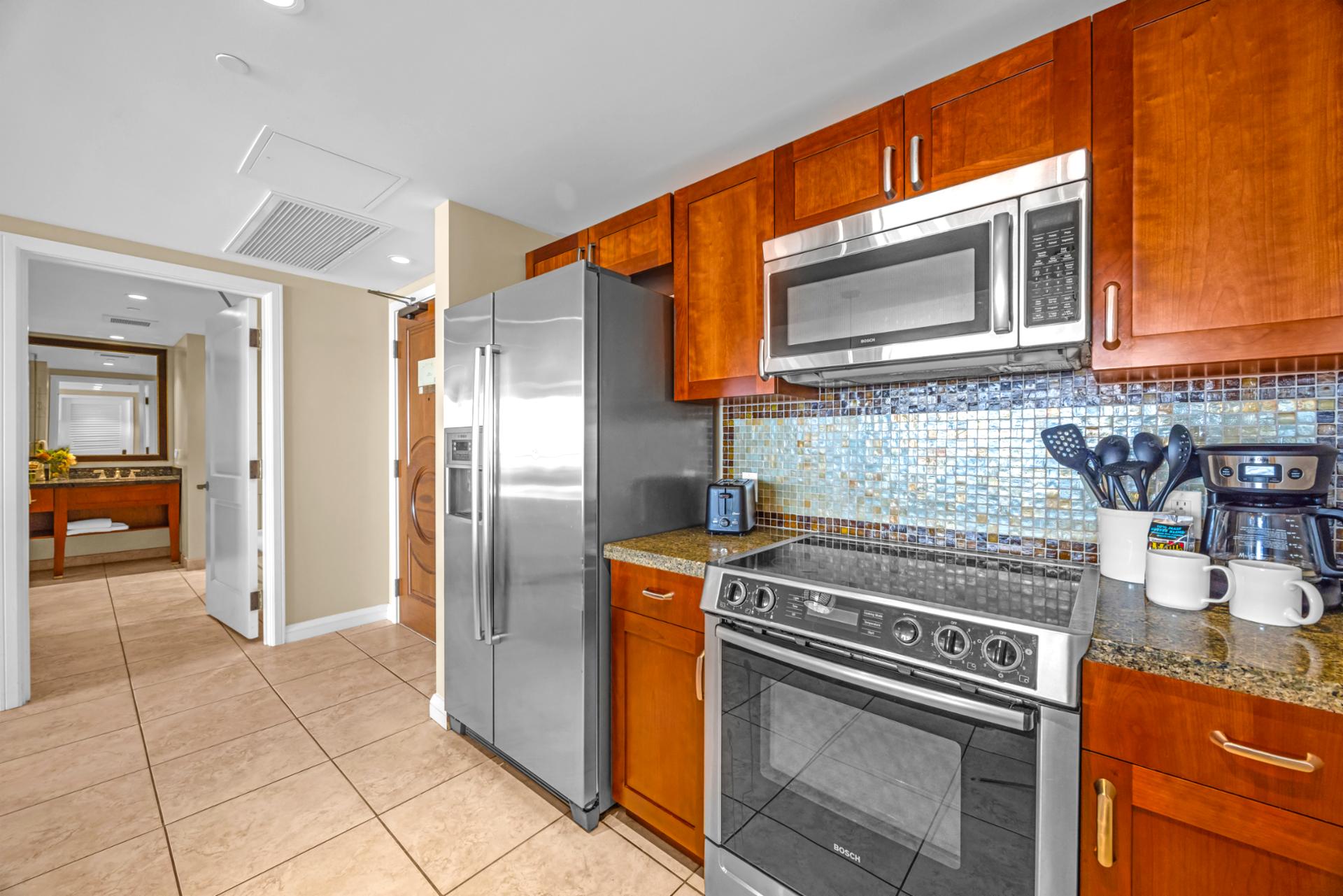 Stainless steel appliances and generous counter space for easy cooking