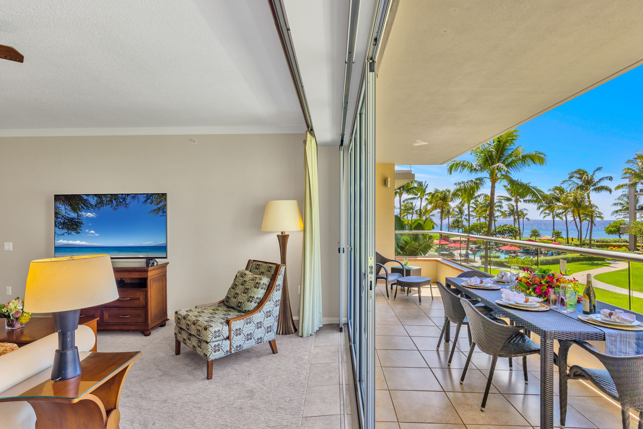 Sunlit, open concept living flows to the lanai, perfect family time in your Maui condo rental 