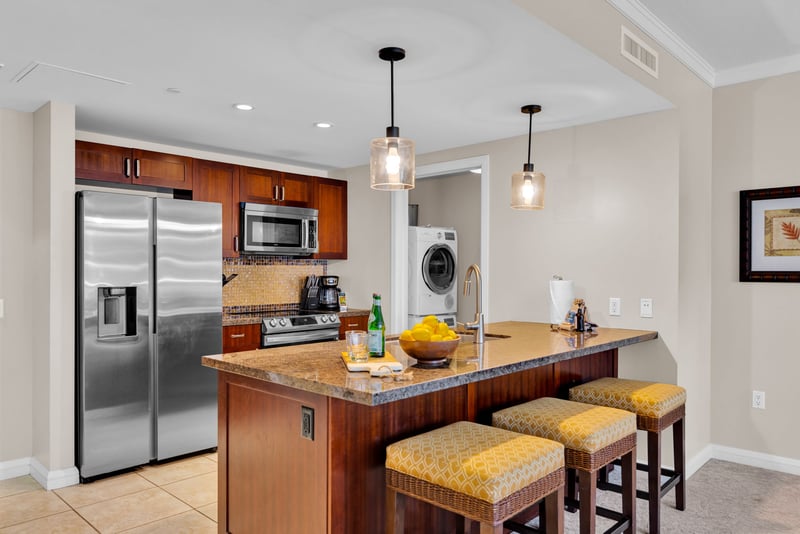 This chef-ready kitchen and bar seating sets the state for happy hour or casual breakfasts