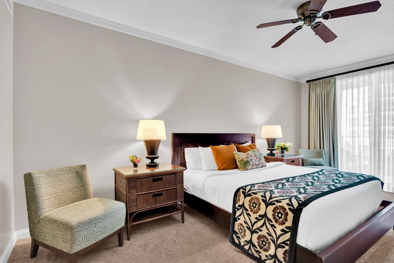 Serene primary bedroom with king bed and lanai access promises restful Maui nights