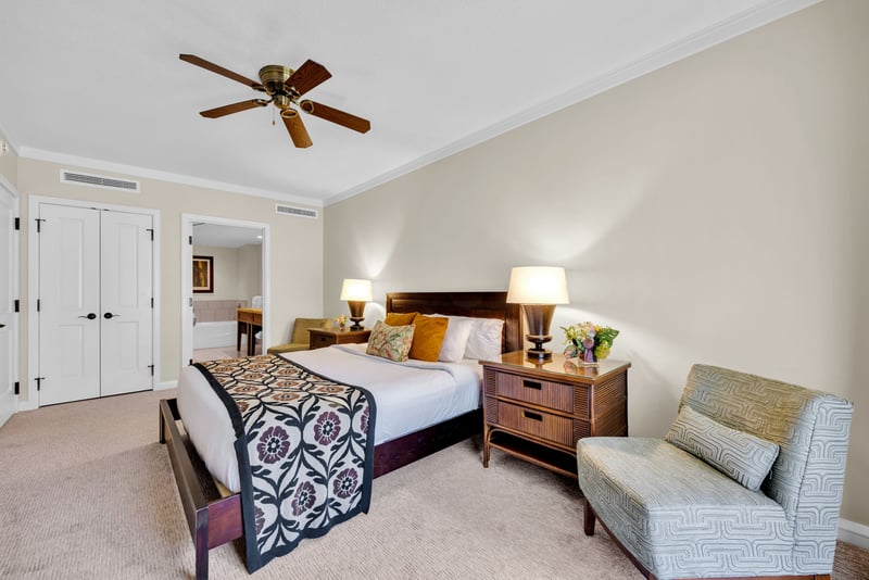 Spacious primary suite with seating and storage keeps longer stays effortless and organized