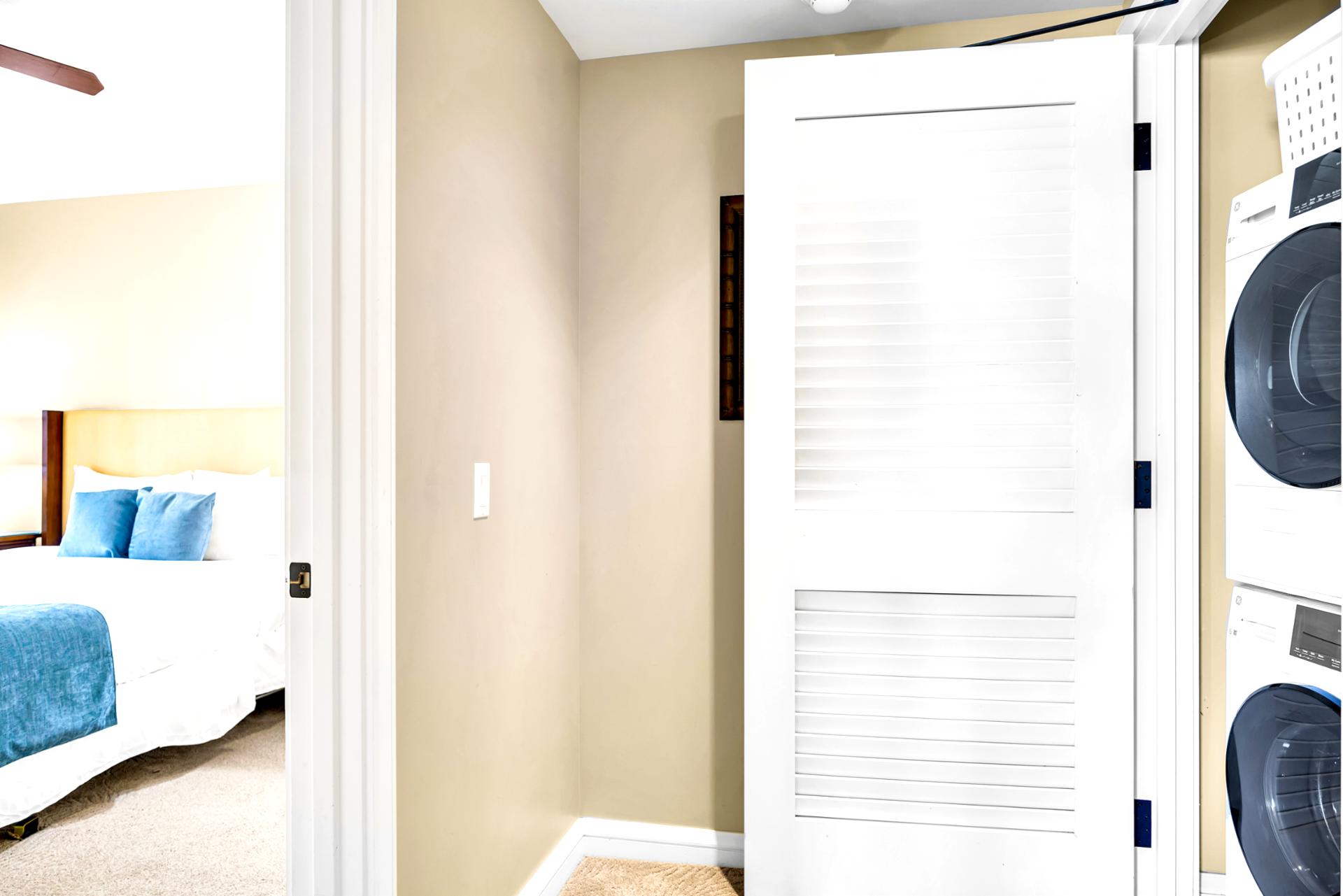 Tuck laundry neatly away behind closed doors, keeping the hallway clean and your suite feeling organized throughout your stay.