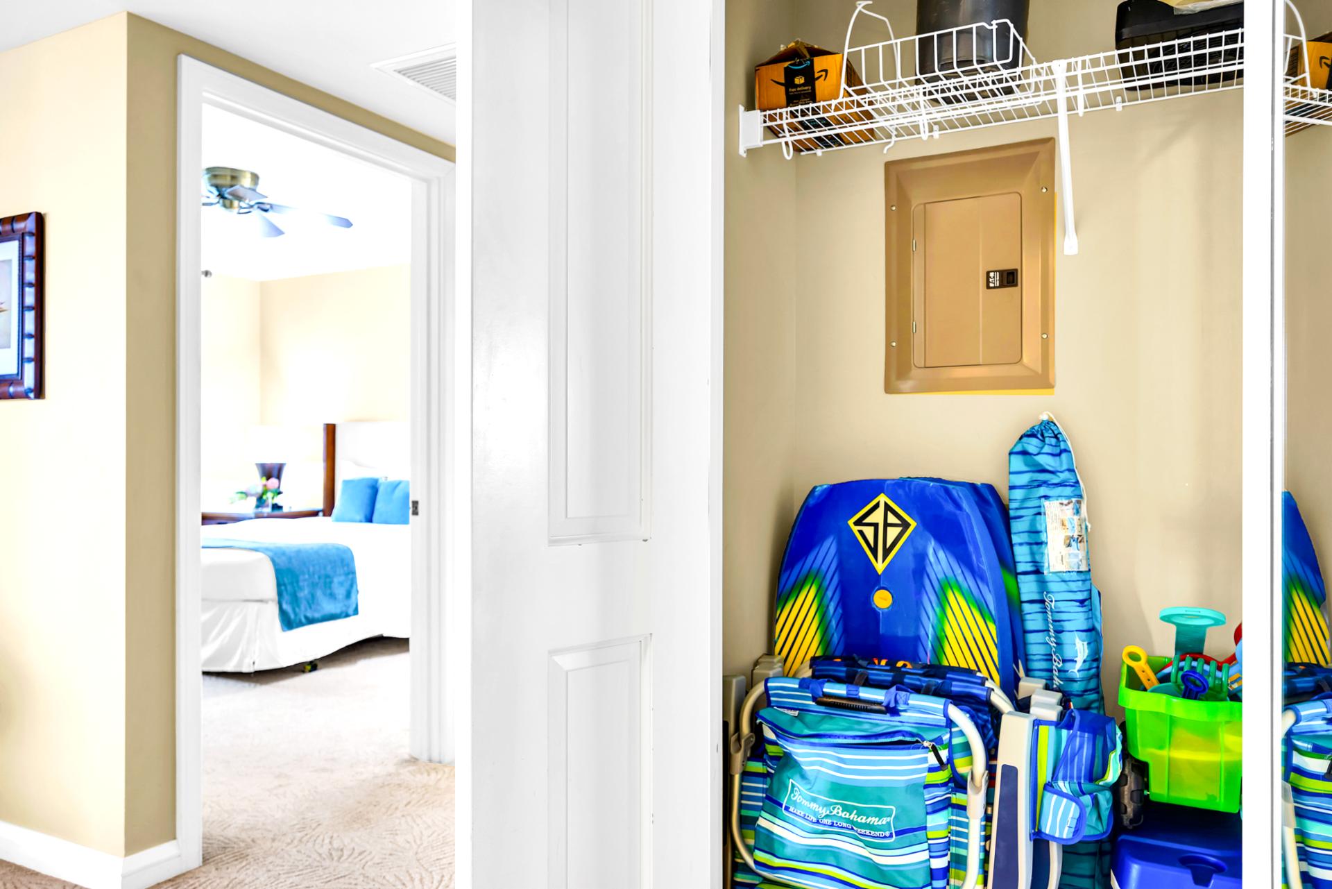 Complimentary beach gear located in the entry closet, with a tidy space that makes coming and going from the beach feel easy.