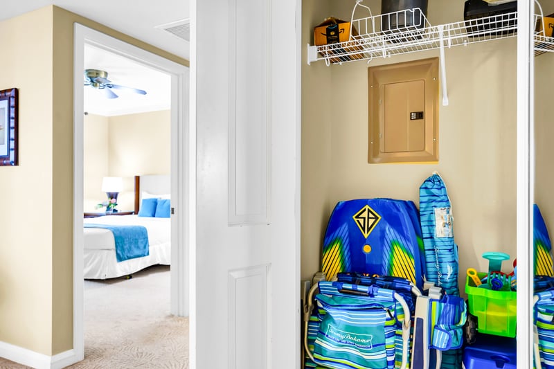Complimentary beach gear located in the entry closet, with a tidy space that makes coming and going from the beach feel easy.