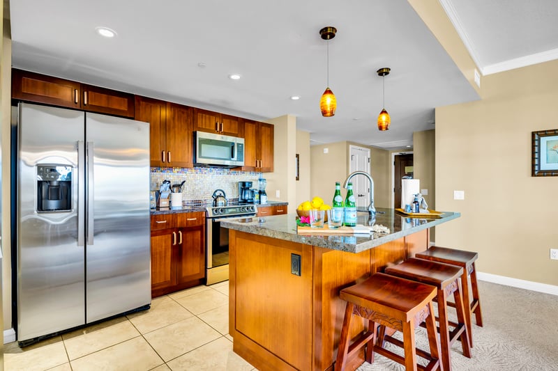 Cook with stainless appliances and generous counter space, so weeknight meals and fresh island fruit prep feel effortless.