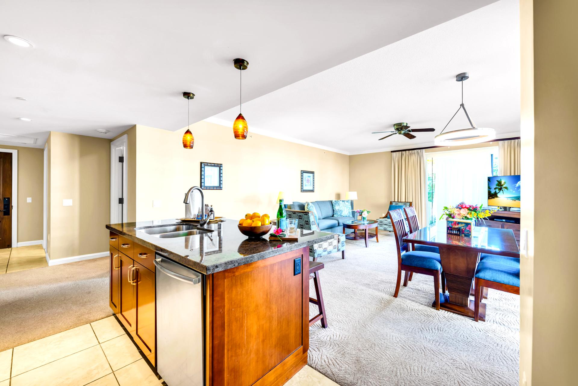 Flow from kitchen to living with ease, with bright finishes that keep the space feeling airy from coffee to cocktails.