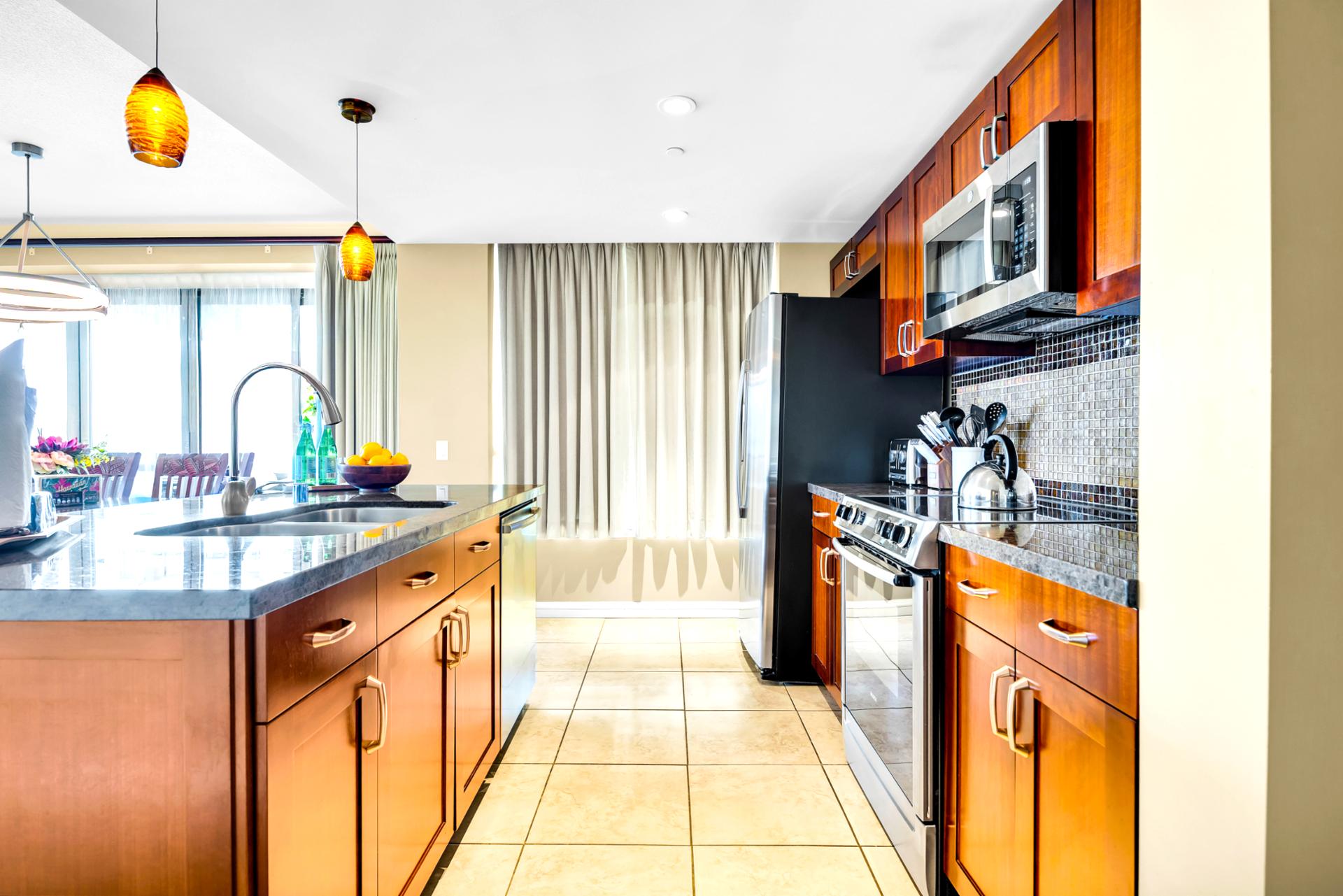 Rinse, chop, and serve with a full-size sink and ample workspace, perfect for casual meals before heading to the beach.