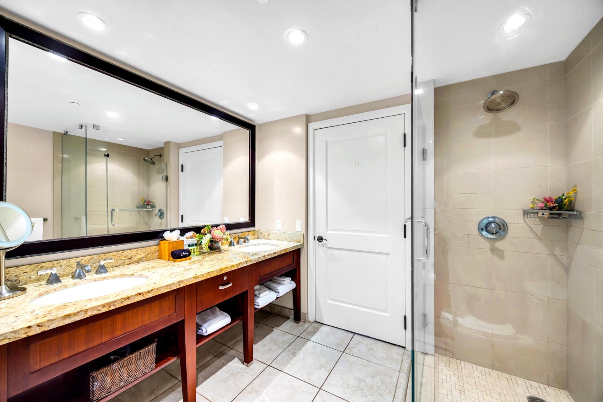 Rinse off in the guest bath with a walk-in shower and generous space, perfect after sandy beach walks at Honua Kai.