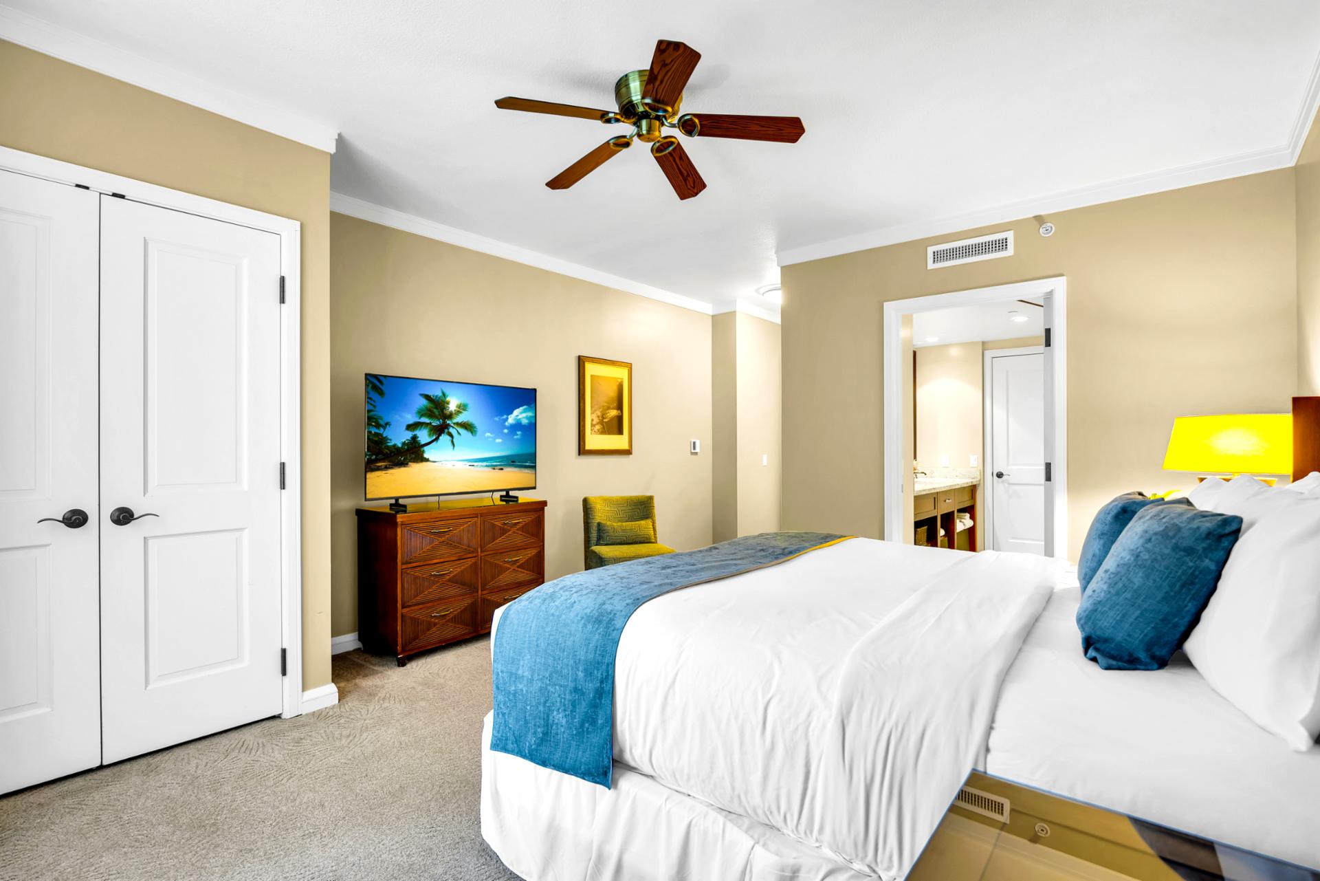 Drift off in the guest bedroom with a King bed and soft island tones, designed for comfortable sleep and easy mornings.