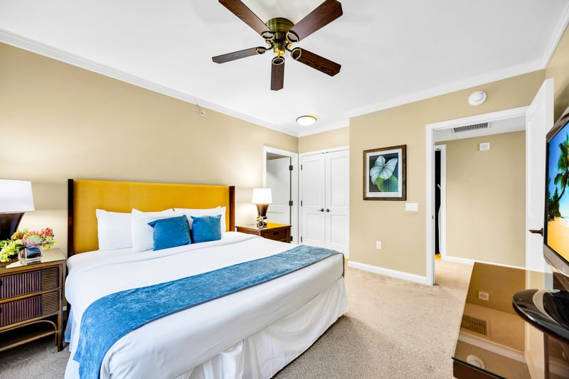 Unplug in the primary bedroom with a King bed and ceiling fan, a calm retreat for winding down after a day outside.