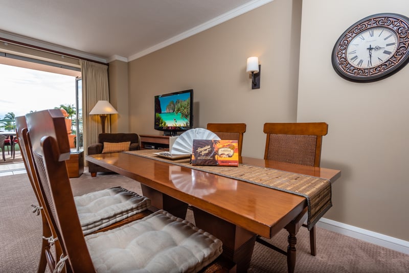 Charming dining area with tropical treats and scenic lanai view. HKK-225