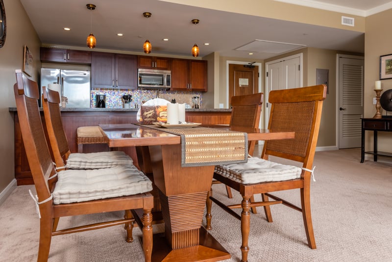 Stylish dining and kitchen area with pendant lights and island vibes. HKK-225
