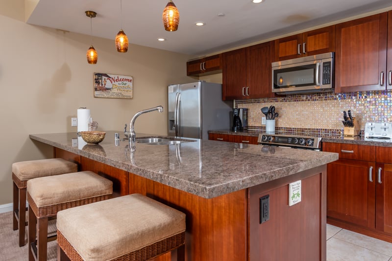 Luxury finishes with custom marble counters - breakfast bar seating for 3 HKK-225