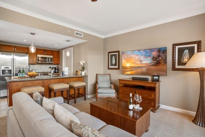 Enjoy open-plan comfort with full kitchen, modern amenities, HDTV & cozy seating—perfect Maui getaway vibes