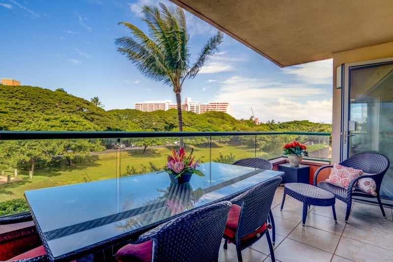 Relax in style with lush views from your private lanai.