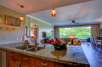 Enjoy island vibes from kitchen to lanai in tropical paradise.