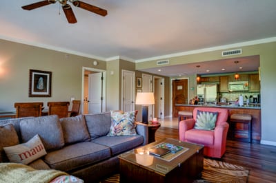 Spacious open-concept living with island charm and modern kitchen comfort.