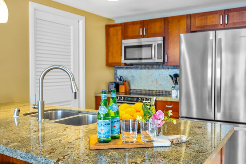 Sparkling counters and a breakfast bar for morning coffee