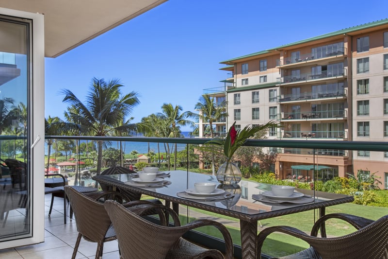 Dine with ocean views, swaying palms, and tropical serenity surrounding.