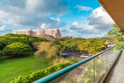 Expansive balcony view of lush island scenery
