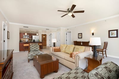 Bright island suite with spacious seating, full kitchen, and dining area.