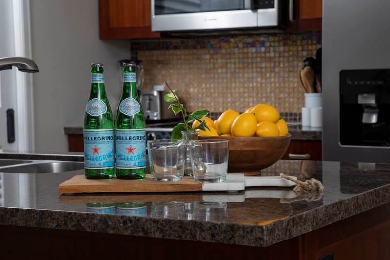 Refreshing island vibes: sparkling water, lemons, and a tropical touch.