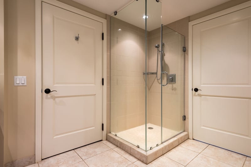 Floor to ceiling glass enclosed shower fine tile details HKK-424