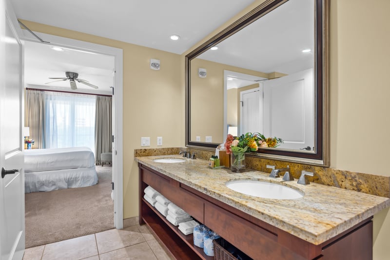 The guest bath features a double vanity, designed for comfort and ease