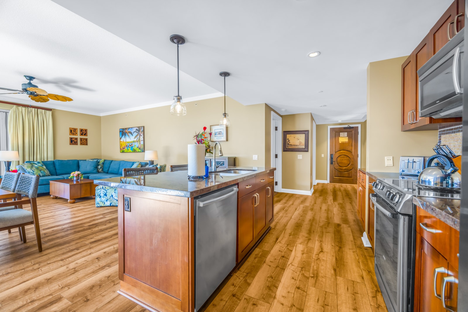 The kitchen connects easily to the dining and living spaces, keeping everyone close and included. HKK-439