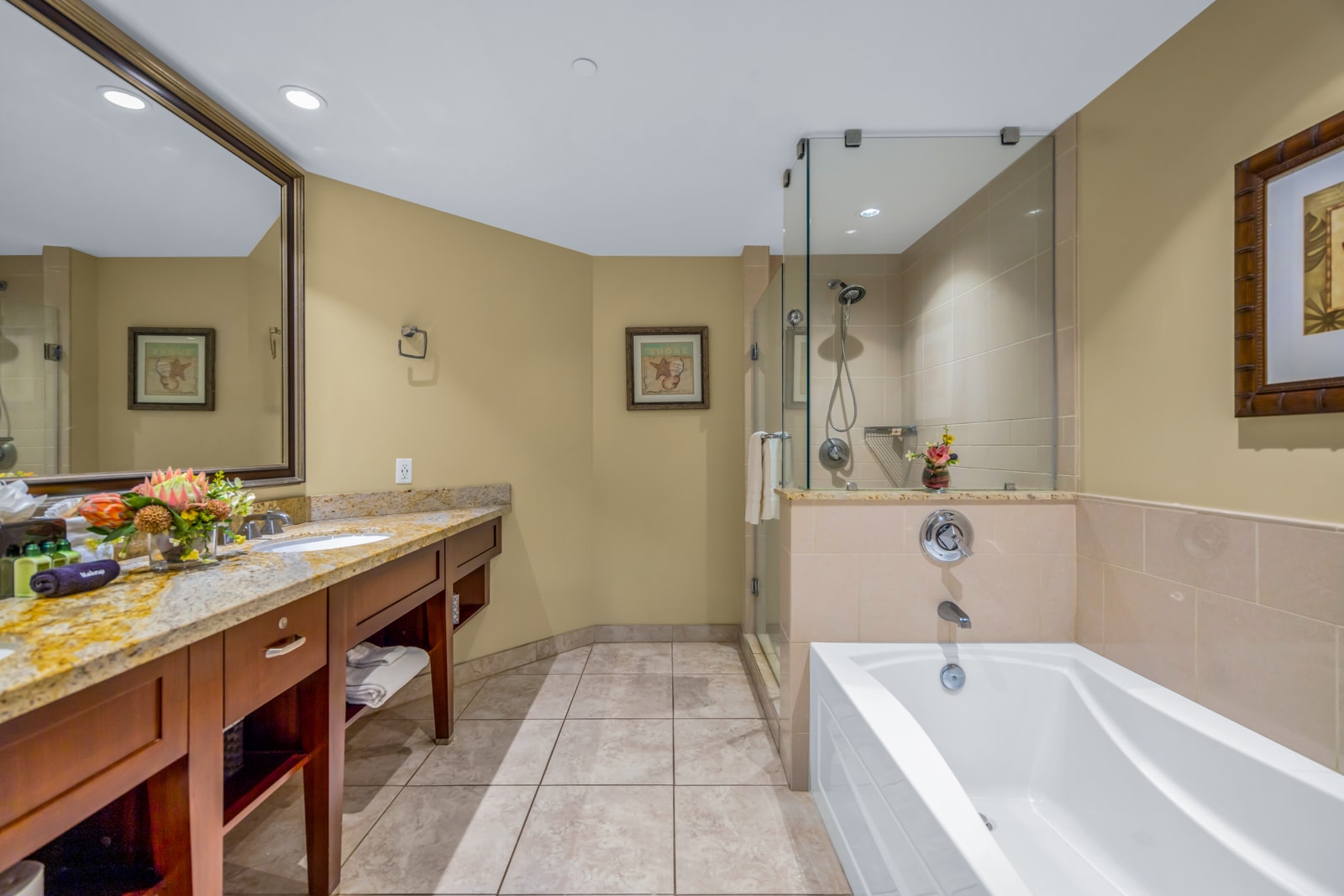 Refresh in your ensuite bath with dual granite vanity, walk-in shower, and separate soaking tub. HKK-439
