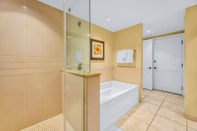 The walk-in shower and soaking tub in the primary bath offer multiple ways to unwind after a day outside.