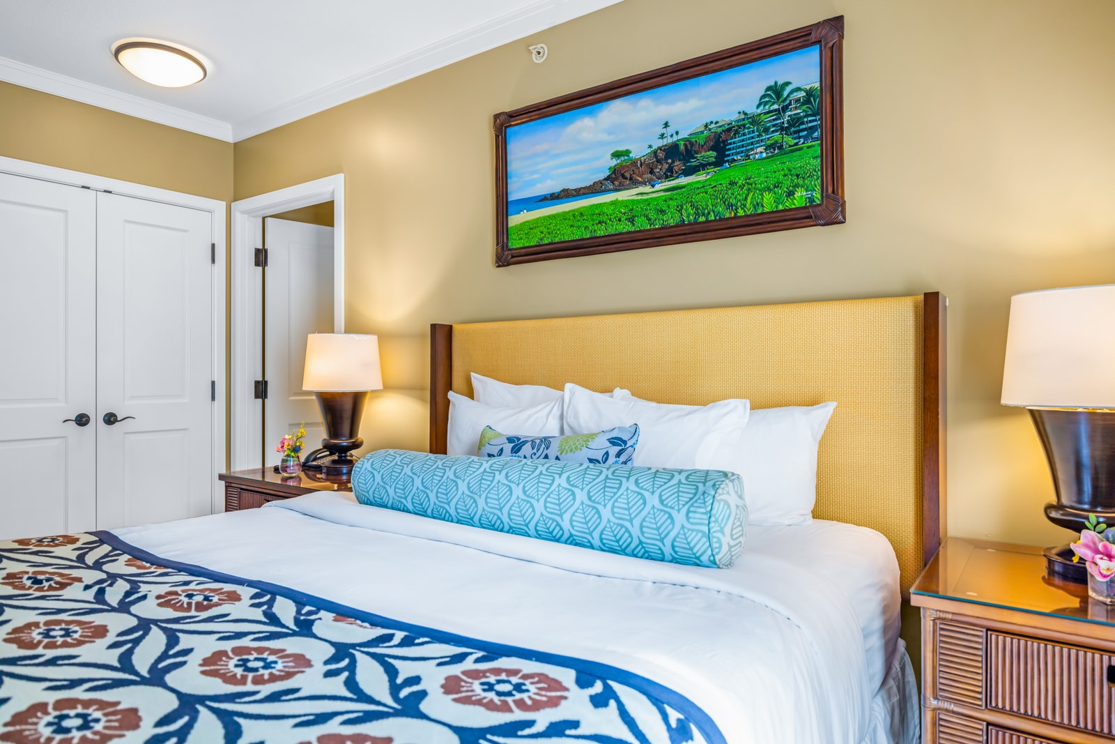 Your primary bedroom features a King bed, Smart TV, and dresser, with warm tones and soft light for restful nights. HKK-439