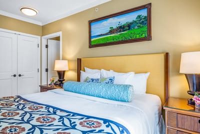 Your primary bedroom features a King bed, Smart TV, and dresser, with warm tones and soft light for restful nights.
