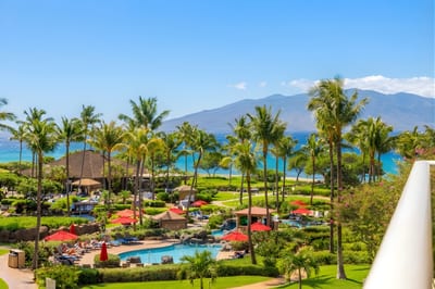 Enjoy panoramic views of the lush Honua Kai resort and sparkling pools just beyond your balcony.