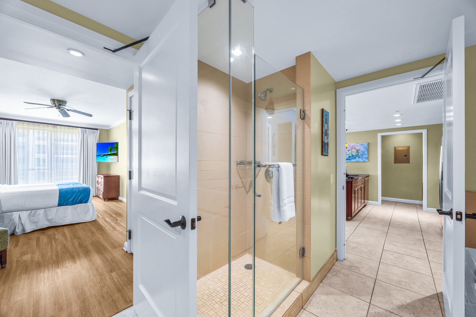 The guest bath features a clean and modern shower design