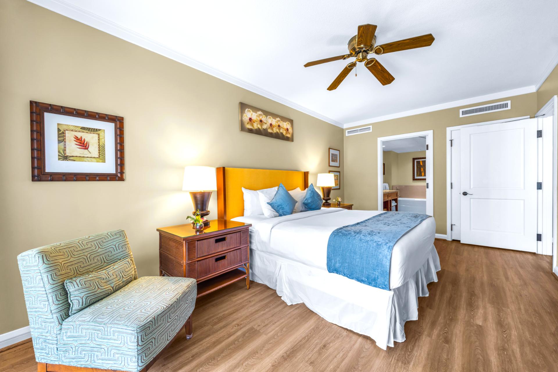 Spacious primary suite with soft coastal touches and a king size bed HKK-443