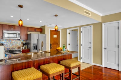 Open kitchen and breakfast bar for quick bites and laughs