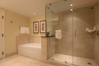 Modern and spacious, this guest bath offers the comfort of home