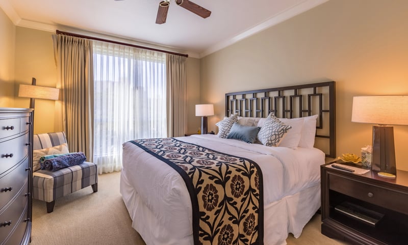 Simple styling and plenty of space make this guest room feel just right