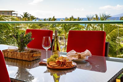 Savor paradise—indulge in a sunset charcuterie with fine wine, ocean views, and island breezes on a private lanai HKK-451