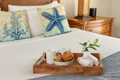 A coastal touch of comfort— enjoy morning coffee in bed, surrounded by ocean-inspired decor and relaxing elegance HKK-451