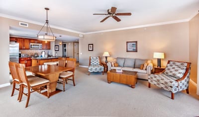Elegant open-concept suite with full kitchen, dining, and comfort.