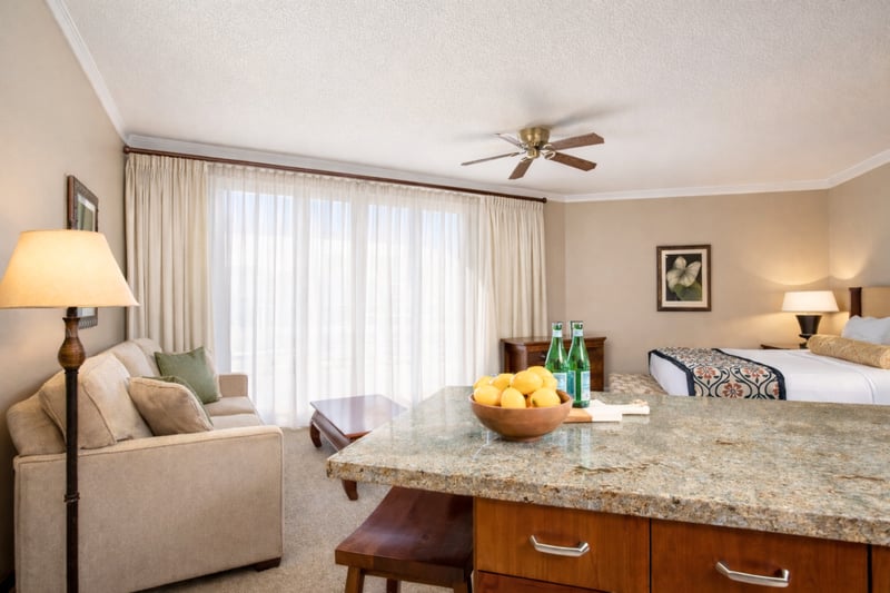 Granite bar seating offers a comfortable spot for breakfast, cocktails, or conversation after a day exploring Kaanapali.  HKK-537