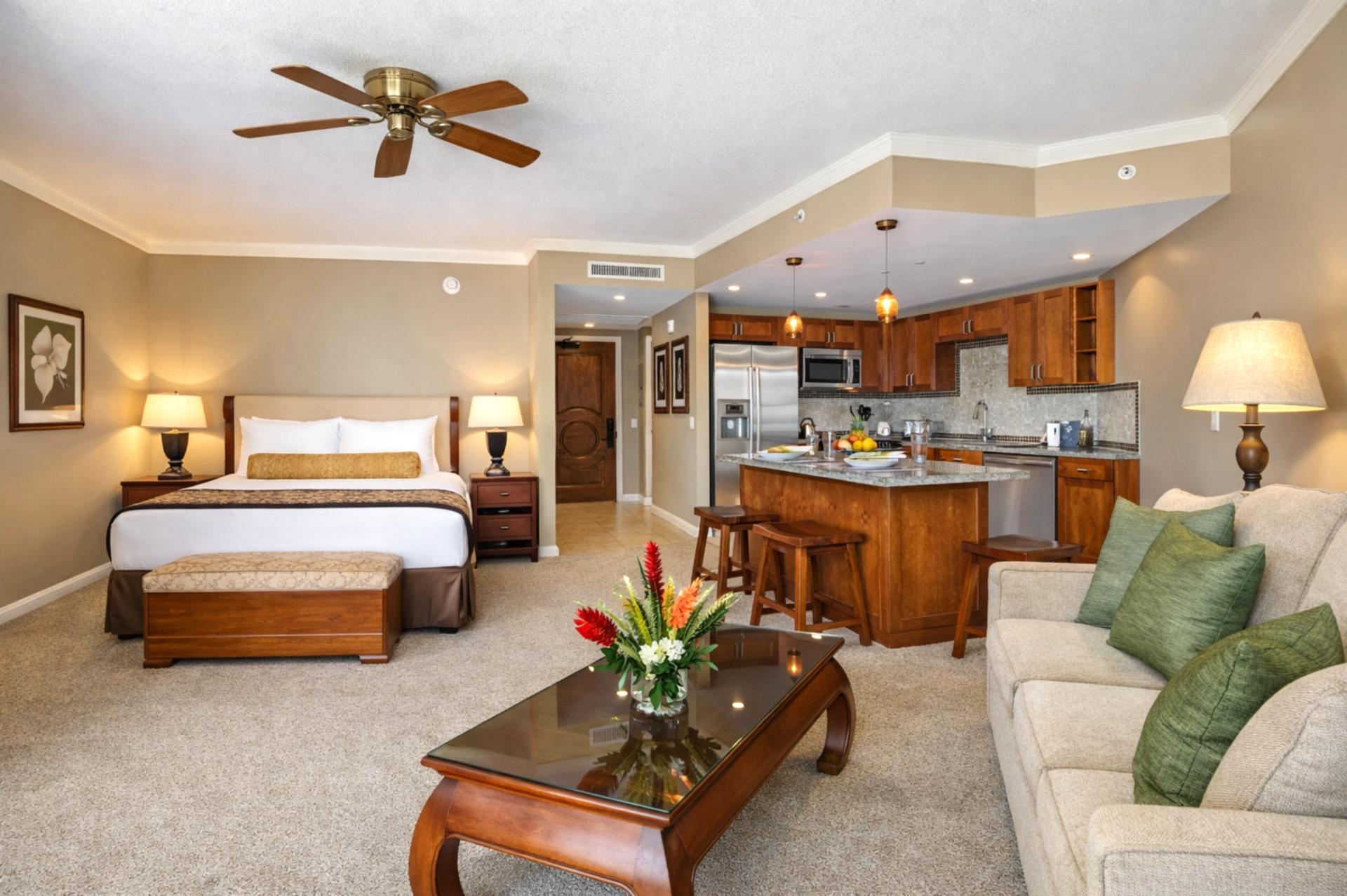 A wide view of your studio shows the seamless layout between sleeping, dining, and kitchen areas, designed to keep your stay comfortable and connected.