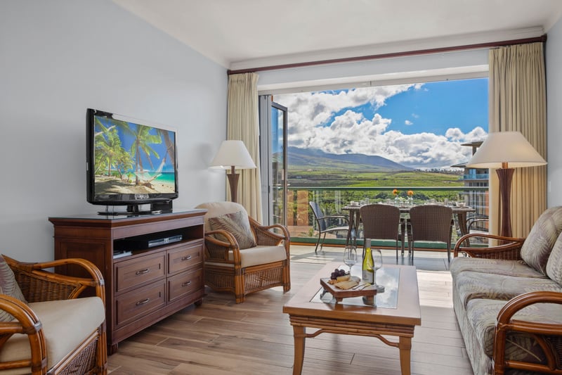 Indoor comfort meets outdoor beauty—mountain views and tropical serenity combined.
