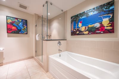 Vibrant tropical bathroom with glass shower and relaxing soaking tub HKK-812